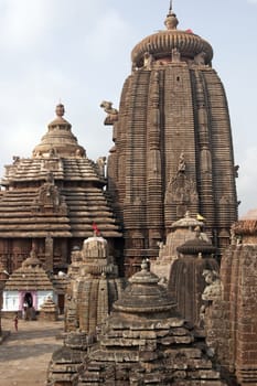 Lingaraja Hindu Temple complex. Ornately carved buildings inside a walled compound. Bhubaneswar, Orissa, India. 11th Century AD