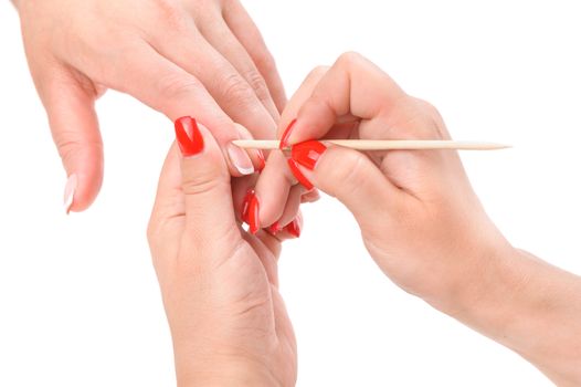 beauty salon, manicure applying, cleaning the cuticles