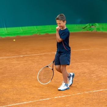 Children at school during a dribble of tennis