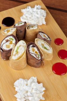 pancake roll with marmalade - dessert dish
