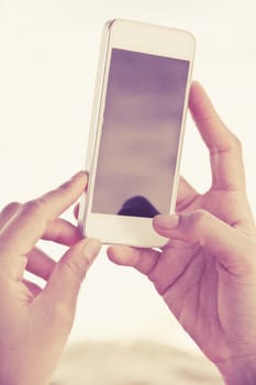 Woman Using a Smart Phone