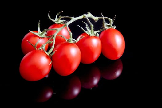 Tomatoes on black