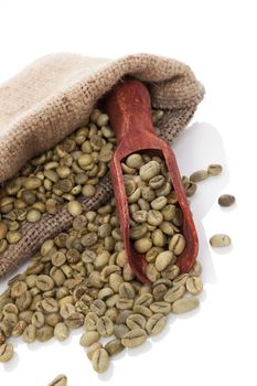 Green coffee beans. Dietary supplement, weight loss concept. 

