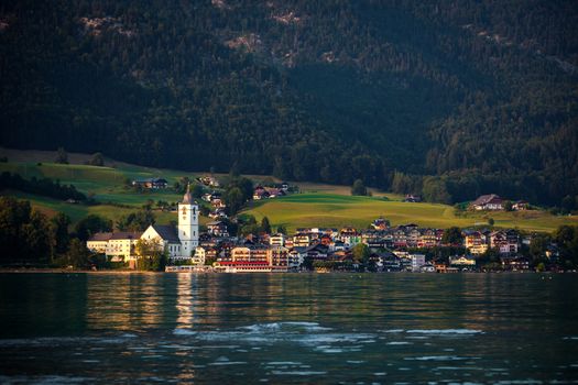 View of St. Wolfgang village waterfront at Wolfgangsee lake at sunset, Austria