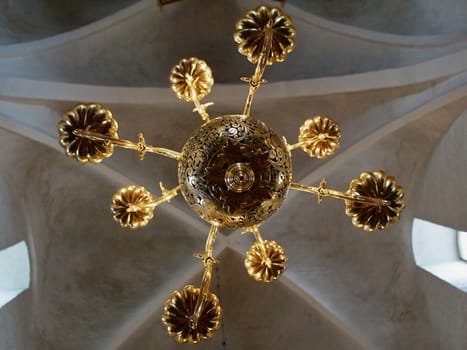 Classical Style Old Beautiful Crystal Chandelier inside a Church        
