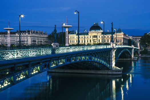 Famous bridge and University in Lyon by night, France