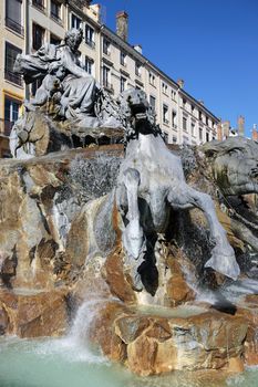 The Bartholdi Fountain on background at the Place des Terreaux in Lyon, France 