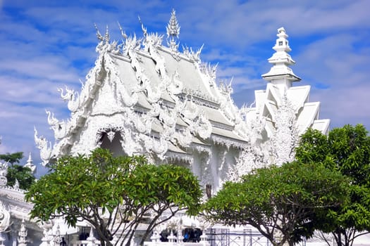 Wat Rong Khun Recovery after Earthquake. More well-known among foreigners as the White Temple, is a contemporary unconventional Buddhist temple in Chiang Rai, Thailand
