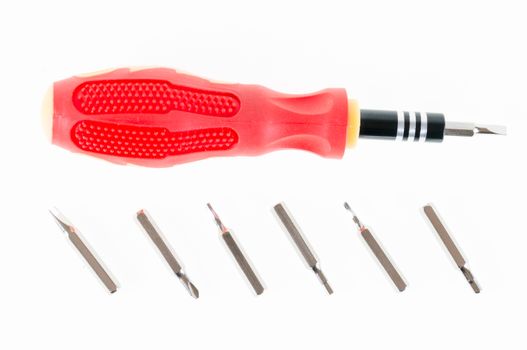 A screwdriver with a set of changable nozzels isolate on white background