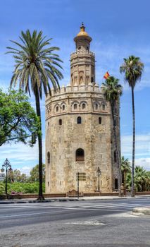 Torre del Oro or Golden Tower, a medieval Arabic military dodecagonal watchtower in Seville, southern Spain, Andalusia, Spain.