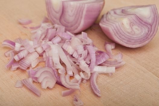 Shallot  peeled on wooden  background