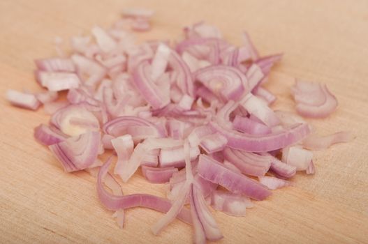 Shallot  peeled on wooden  background