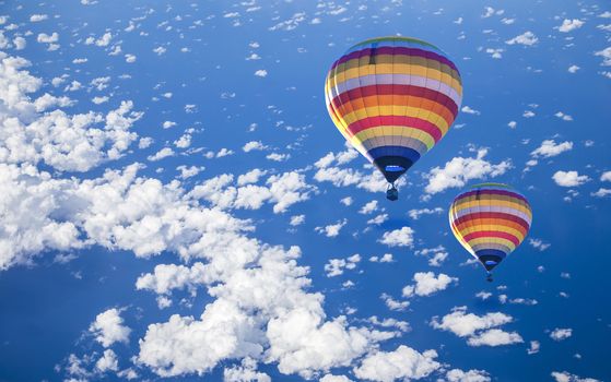 Hot air balloon on sea with cloud