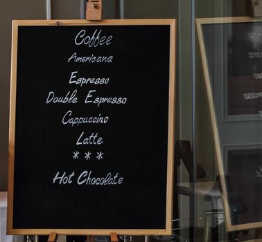 Coffee menu in black board at cafe