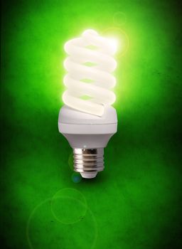 Picture of an eco-save bulb in green background.
