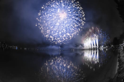 Fireworks on the Lugano Lake in a summer evening, Lavena-Ponte Tresa