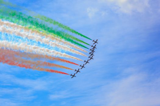 TRIESTE, ITALY - JUNE, 01: View of Italian military airplane called frecce tricolore "tricolor arrows" in acrobatics on June 01, 2014