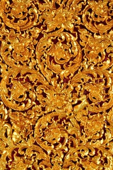 Thai Art of Gold wood Carving on red background