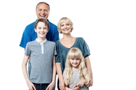 Happy attractive family isolated on a white background.