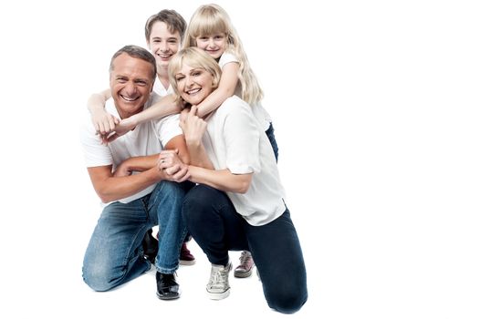 Happy family portrait smiling isolated over a white background