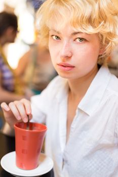 Casual Dressed Beauty Girl With Cup of Coffee.