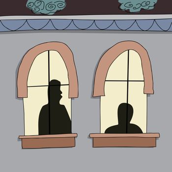 Silhouette of two people next to a window at night