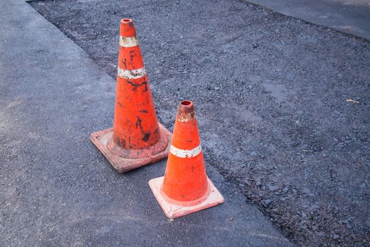 Cones on the road in a construction site.