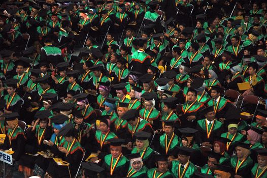 bandung, indonesia-april 18, 2012: college graduation of universitas pendidikan indonesia.