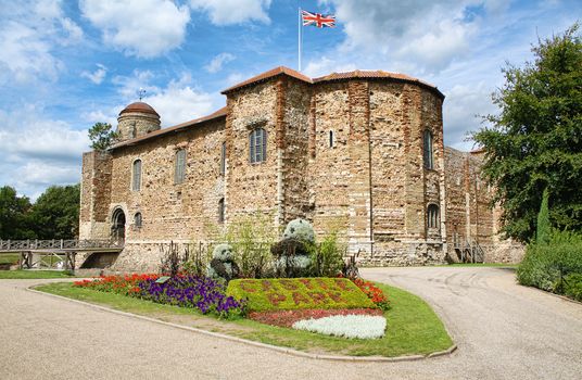 Medieval Norman castle and Castle Park gardens in spring, in Colchester, Essex, England, United Kingdom.