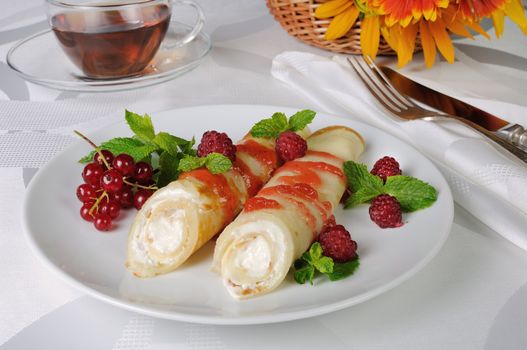 Pancakes with cottage cheese with raspberry syrup