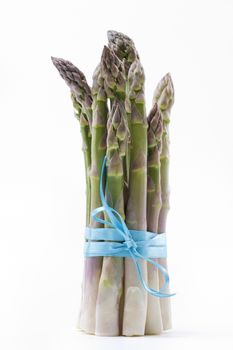 Raw asparagus isolated on a white background