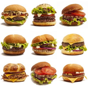 Set of various tasty burgers isolated on white background