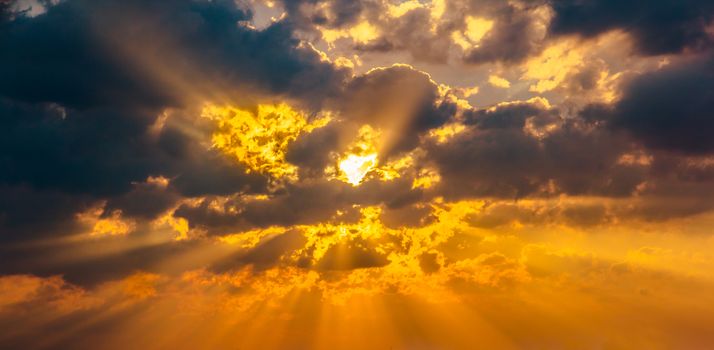 Cloud sun beam ray light warm orange color Dramatic background