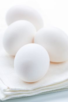 Eggs on a white background, shallow dof.