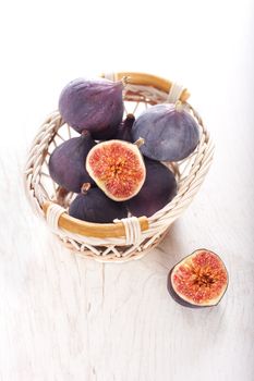 Fresh figs on wood background