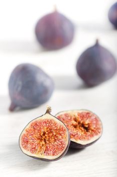 Fresh figs on wood background