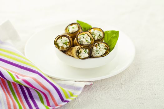 Healthy eggplant rolls stuffed with cheese