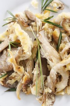 Fried oyster mushrooms prepared with rosemary