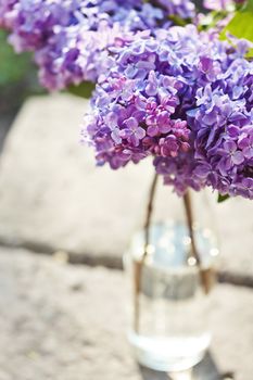 Spring bouquet of fresh lilac in a vase
