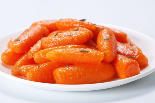 Honey glazed baby carrots with thyme