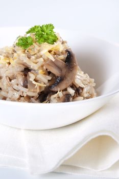 Mushroom risotto with parsley, italian cuisine.