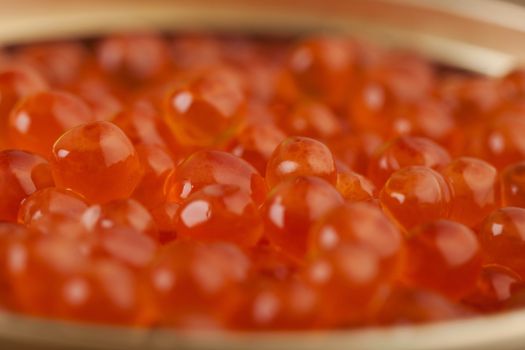 Delicious red salmon caviar macro photo