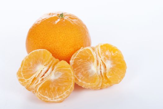 Ripe tangerines on white background. 