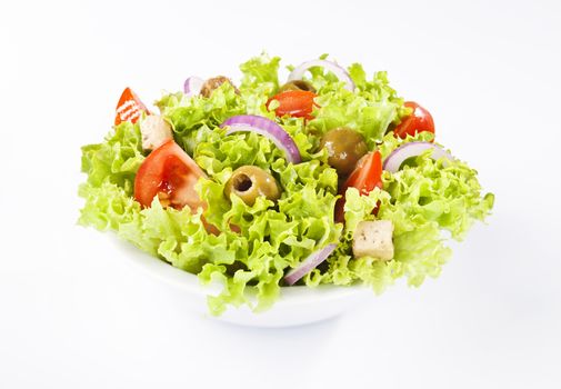 Healthy greek salad on white background