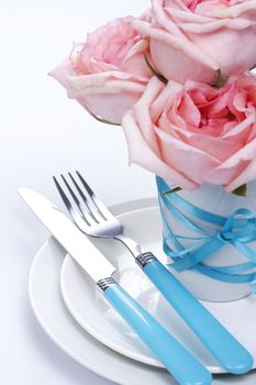 Romantic table setting with roses