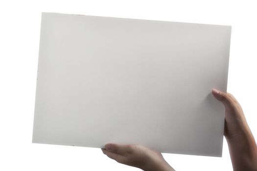 A light white plastic laminate square blank sign supported by young hands on light background
