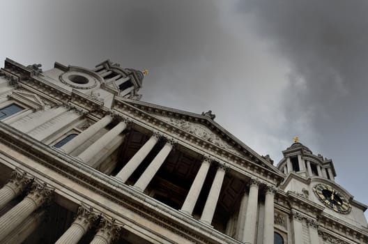 St Pauls Cathedral facade at angle under grey sky