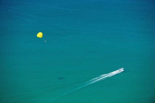 parashoot in Patong tropical beach from aerial view, Phuket. Thailand.