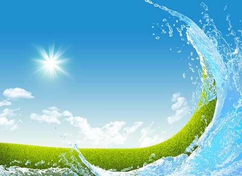 Green meadow and water splash on blue sky background