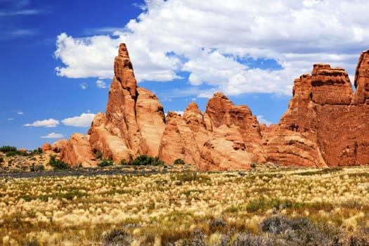 Red Orange Rock Pinnacle Formation Canyon Grasslands Arches National Park Moab Utah USA Southwest. 